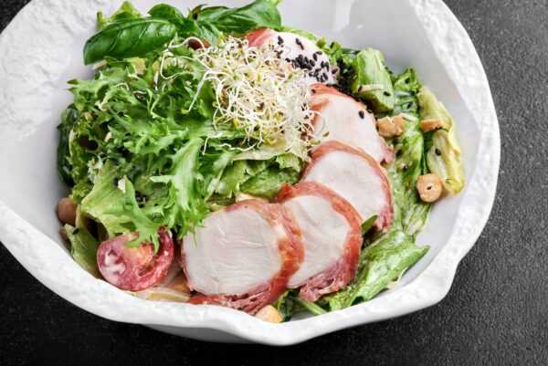 Caesar salad with chicken in Asian-style