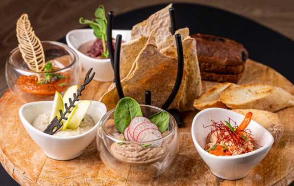 Assorted spreads with fragrant bread of two types and croutons