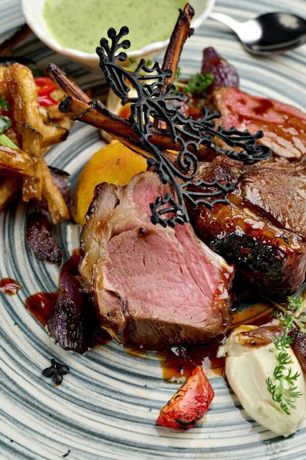 Rack of lamb sous vide in oriental spices with spicy sauce